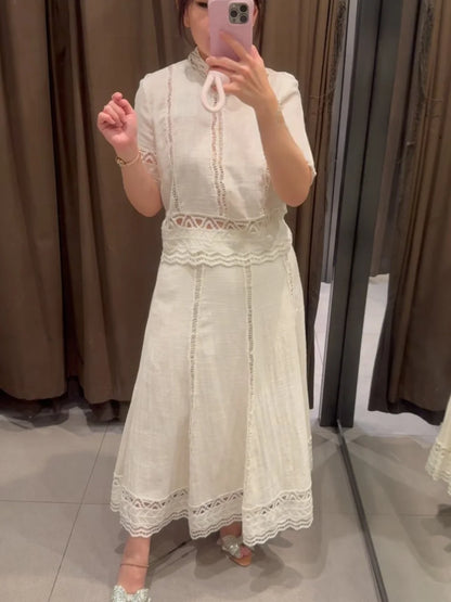 🍒Crochet top round neck design  short sleeve smart casual women  and matching white midi a- line skirt with side zipper suit The White Summer