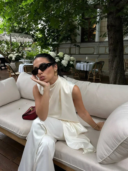 🍒White satin two piece set silk outfits Irregular fashion sleeveless party wear long tops for women  and high waist trouser suit part occasion wear Get A Fashion Angle